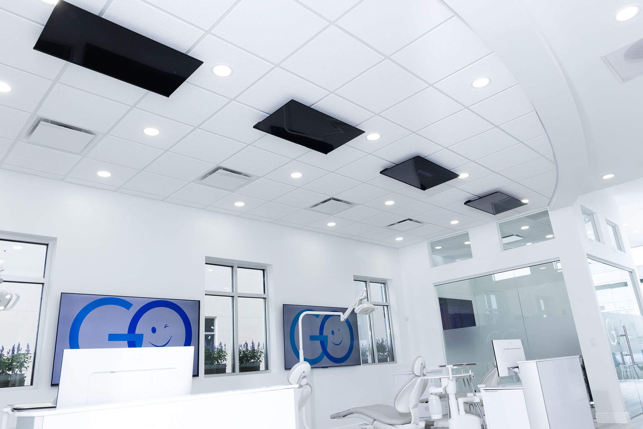 Woman entering dental clinic with a smile